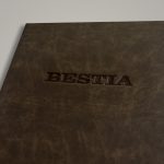portamenu bestia oficio